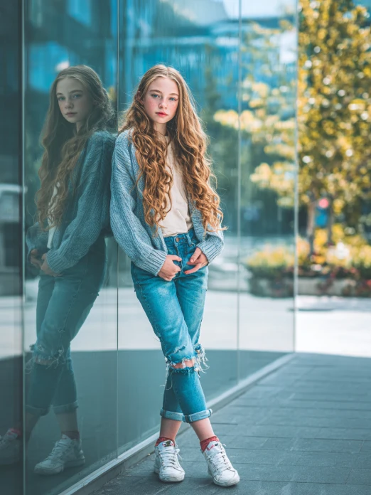 stylized ai young models in stylish pose in jeans top with natural lighting from ai fashion model generator